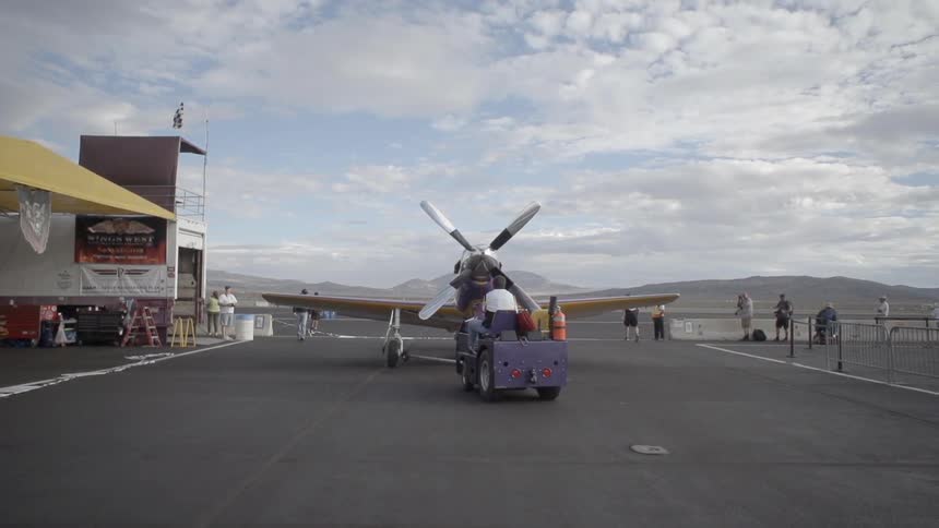 A small plane on a runway