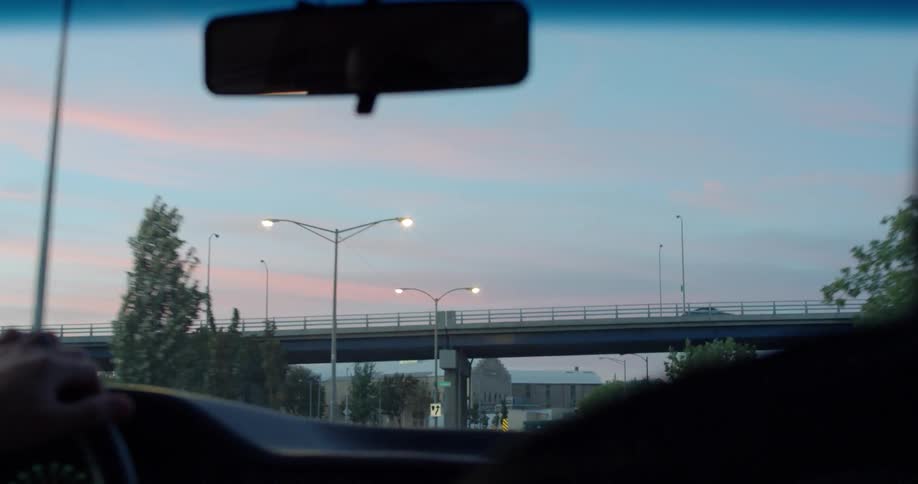 Car drives under and overpass