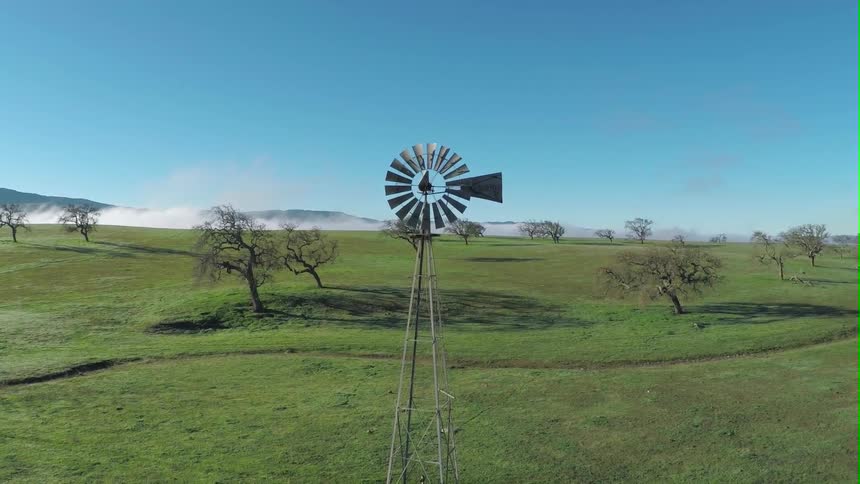 A windmill in a field