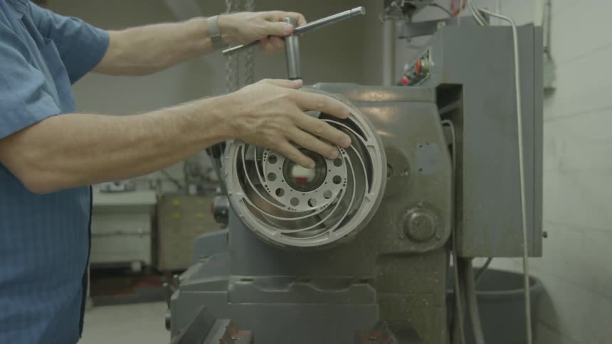 A person working on a machine