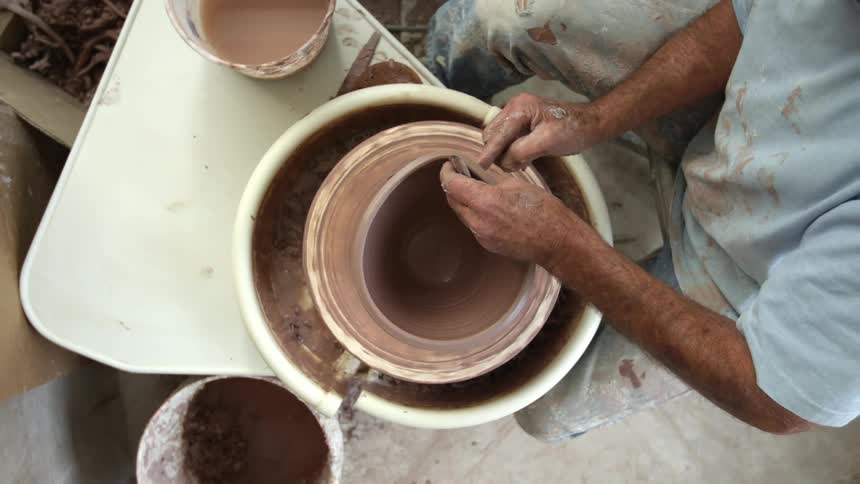 A person making pottery
