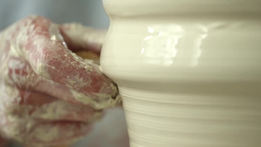 A person making pottery