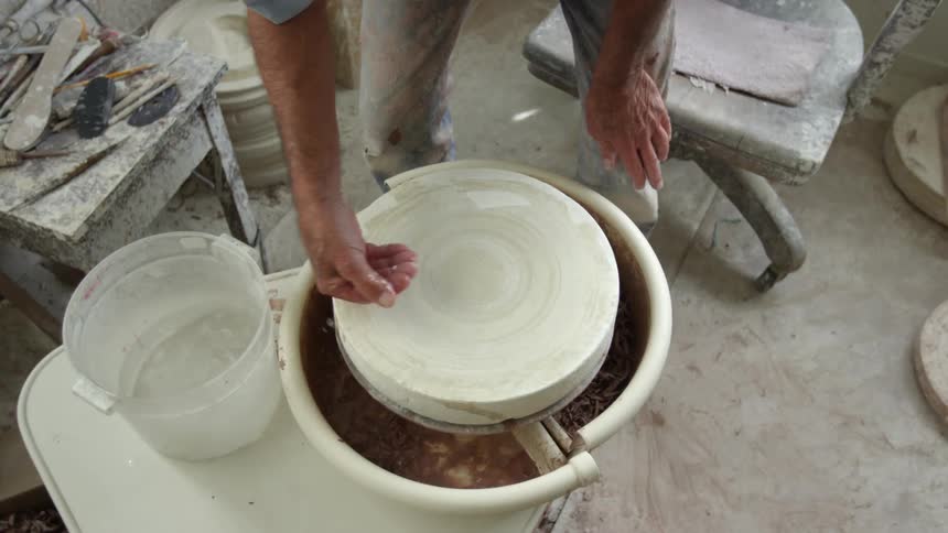A person making pottery