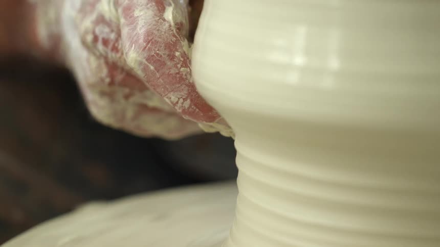 A person making pottery