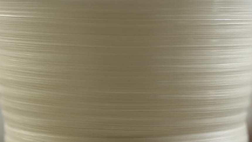 A spinning sculpture in a pottery wheel
