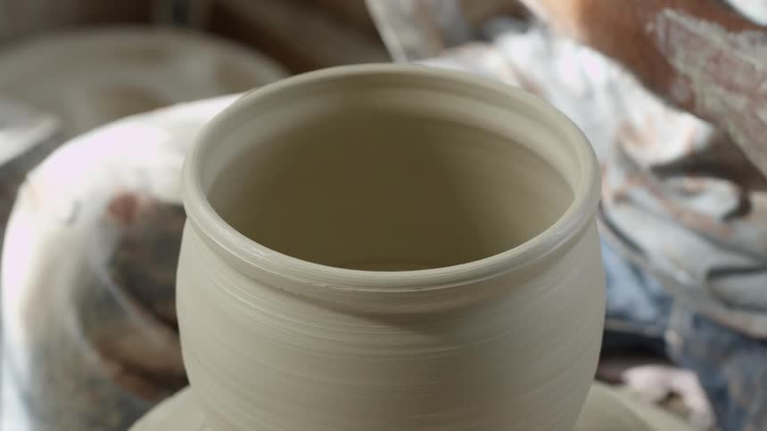 A person making pottery