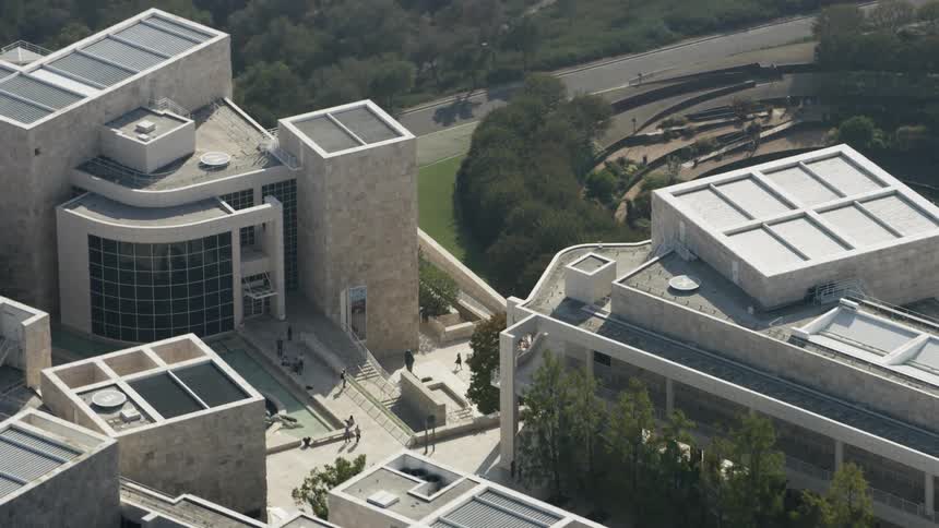 Large white building with many sections