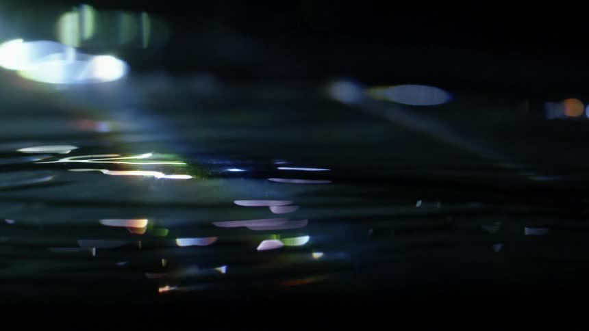 Light shines on rippling water