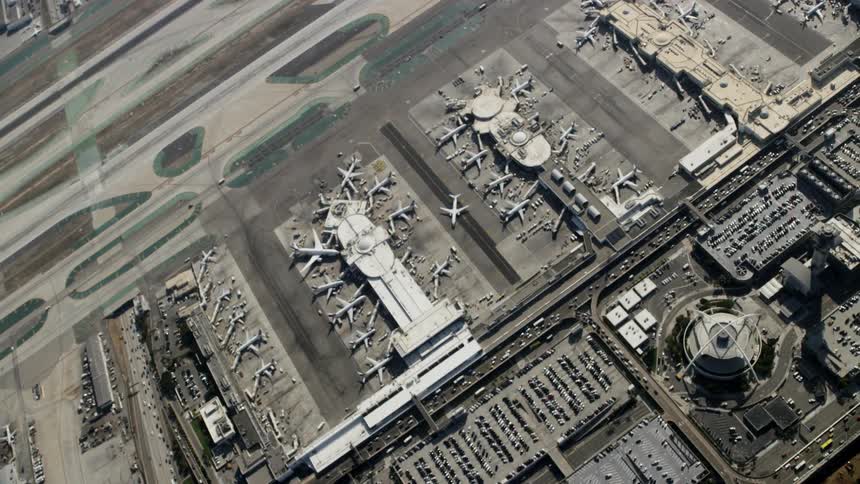 The planes are all docked in the airport