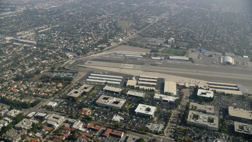 A large city with an airport in the middle