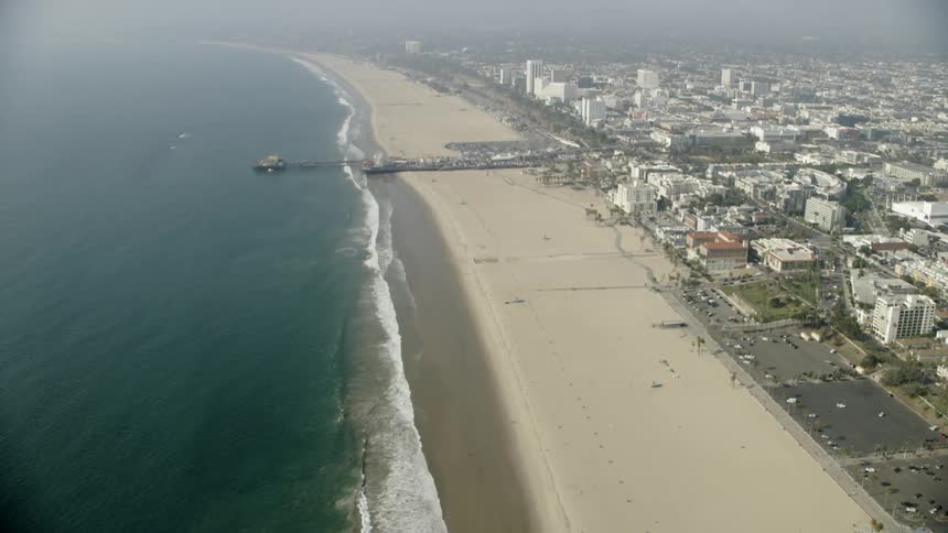 City next to the beach and ocean