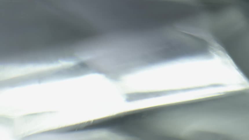Light reflecting off a clear surface
