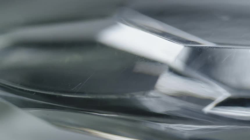 Light reflects on a still surface