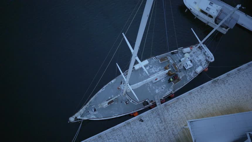 A boat sits parked at the dock