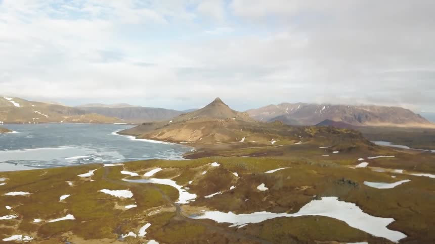 Snowy plains near a river