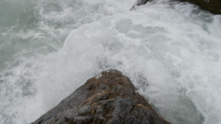 A river flows over a cliff