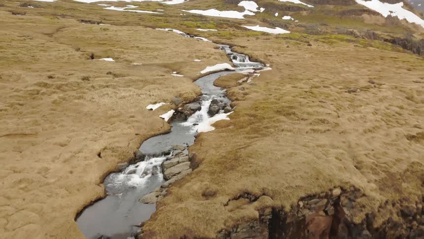 A river flows over a cliff