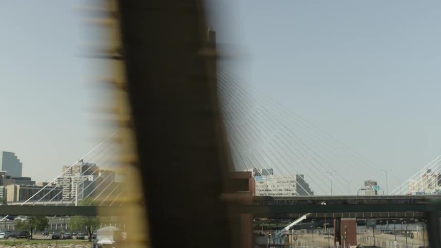 View of a bridge with a city in the background
