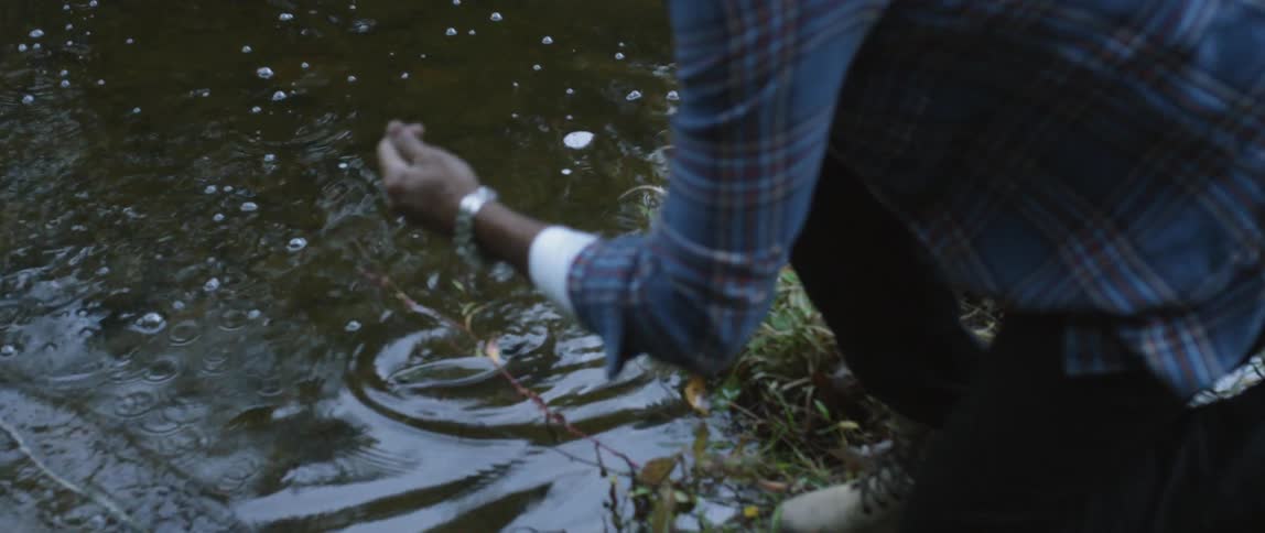 A man catches a fish on a fishing line
