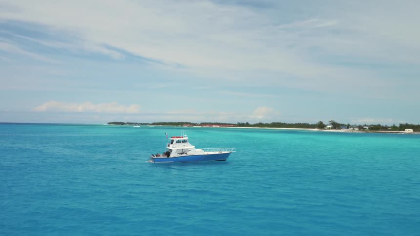 A boat bobs on the waves