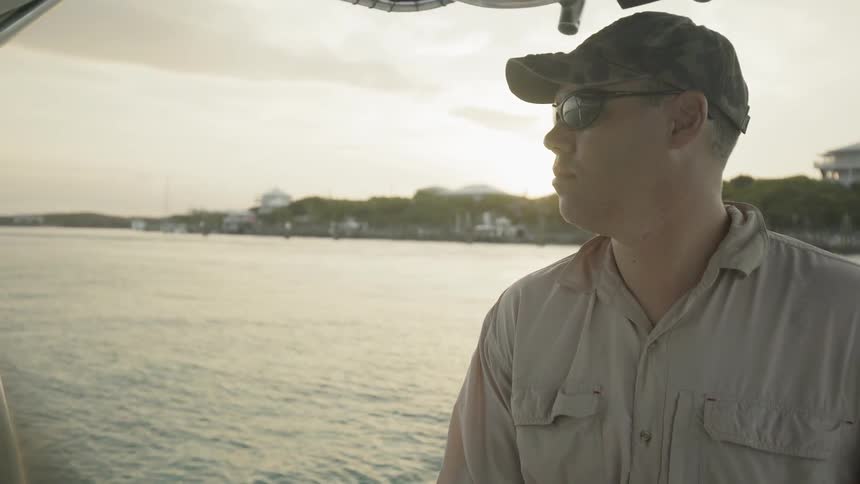 Man captains a boat