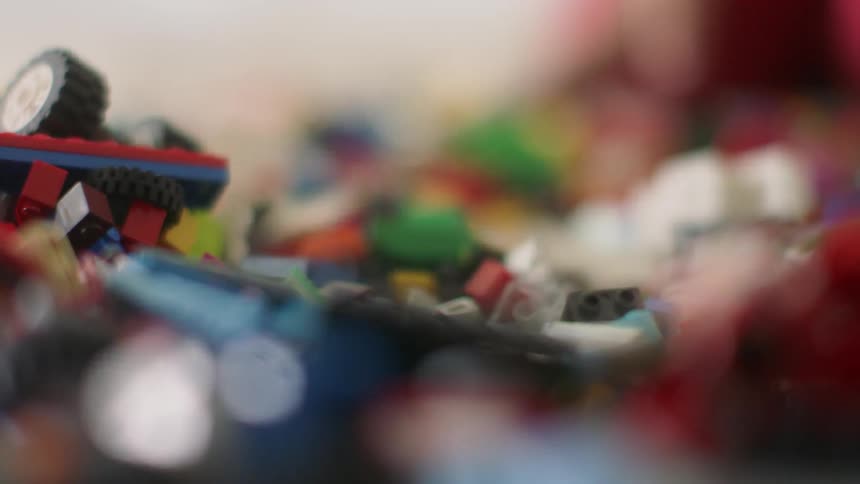 A child plays with toy building blocks