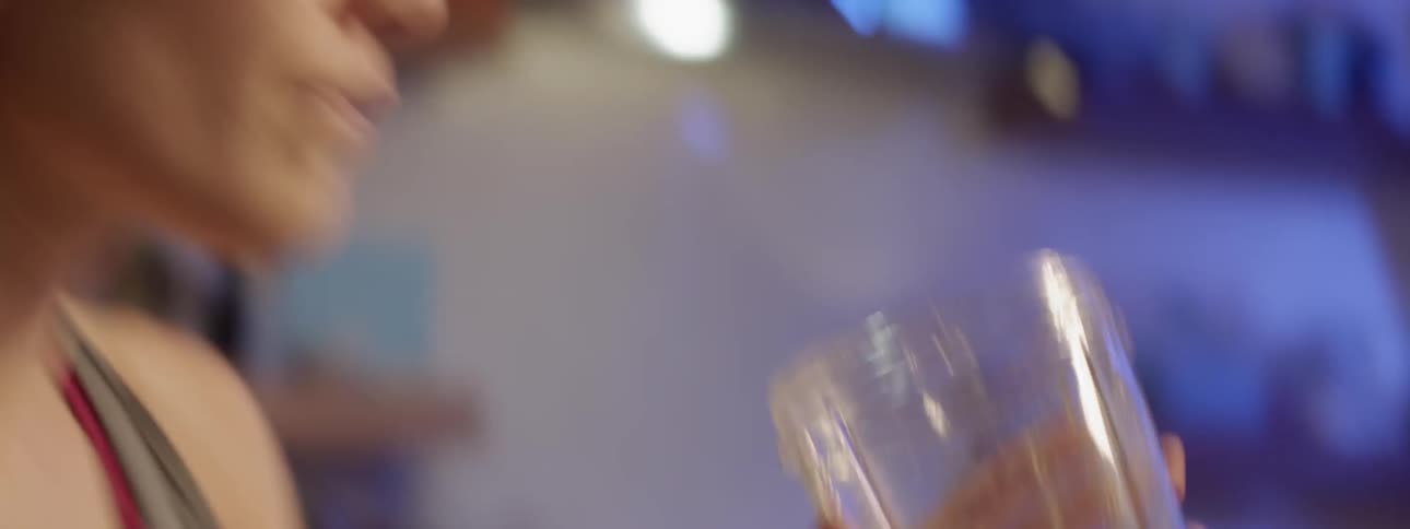 Woman drinks glass of water
