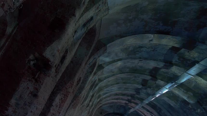 Dark arched tunnel-like area
