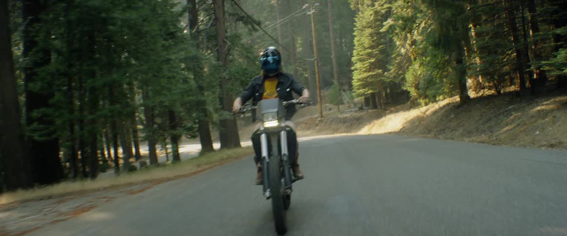 Man on dirt bike pops wheelie