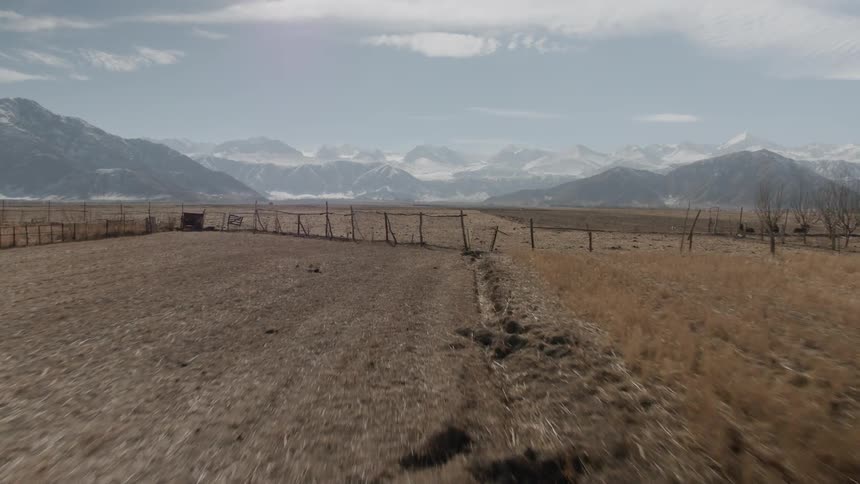Empty farmland is being flown over