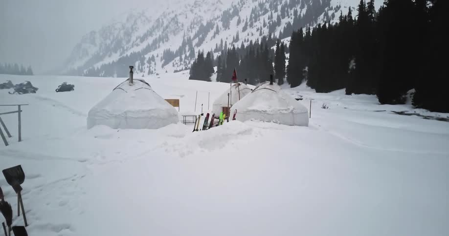 A small camp covered in snow