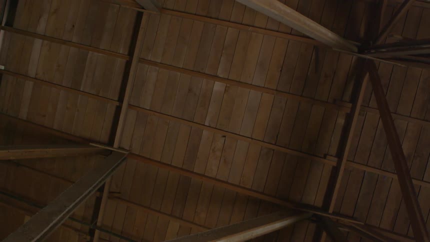 A wooden roof is shown