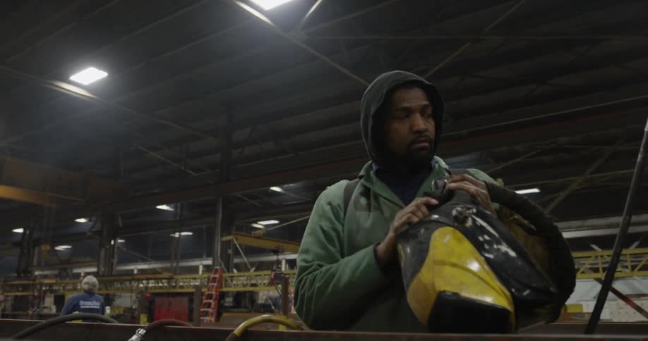 Welder removed his helmet