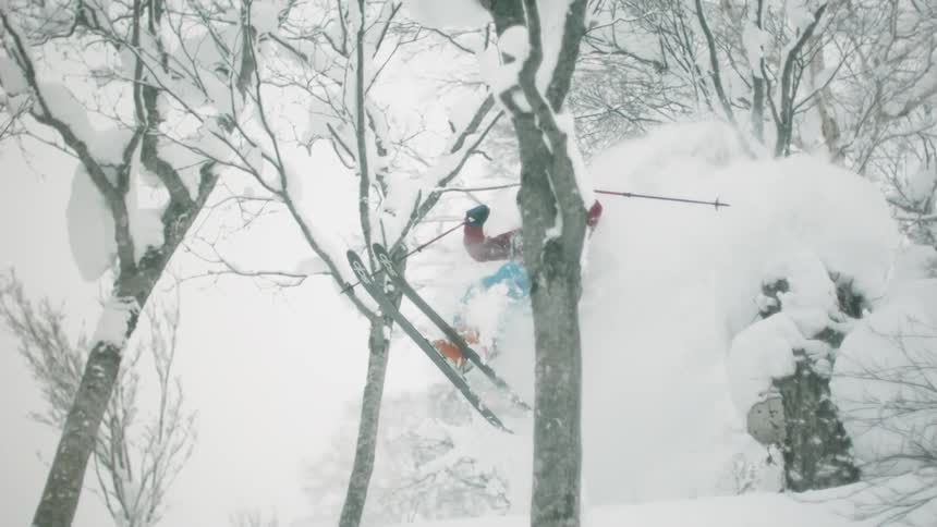 A skier explodes a snow pillow