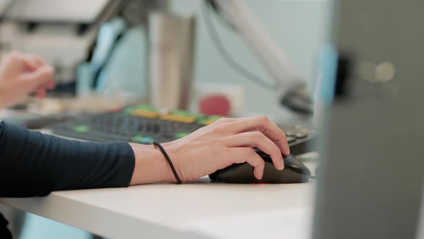 A person works on a computer