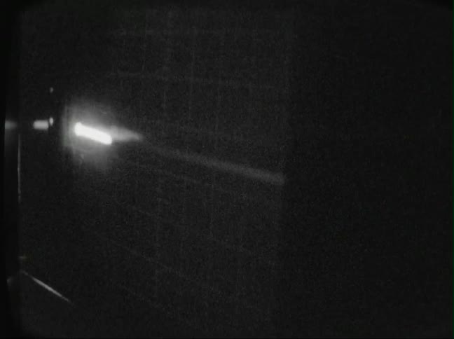 A monitor has flashing white lines going past