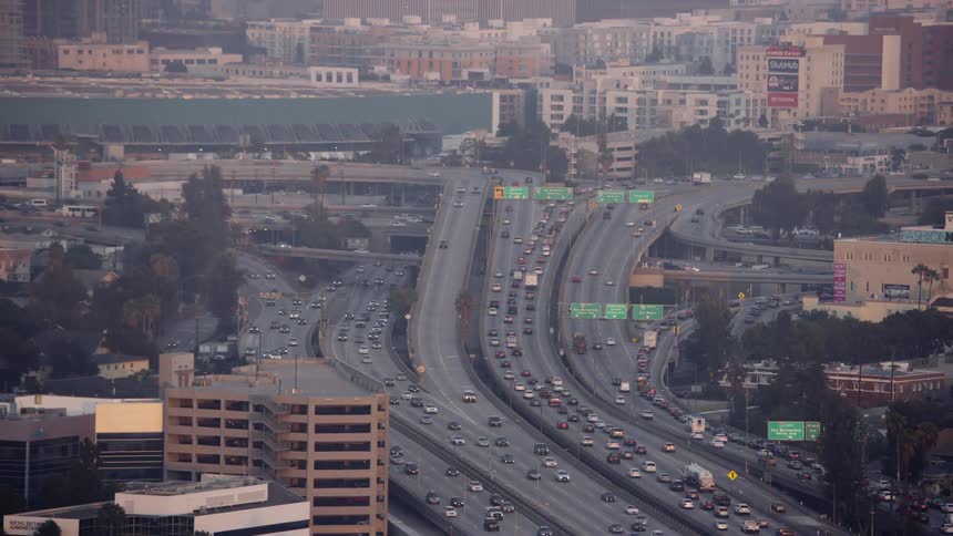 The expressway is busy with traffic throughout