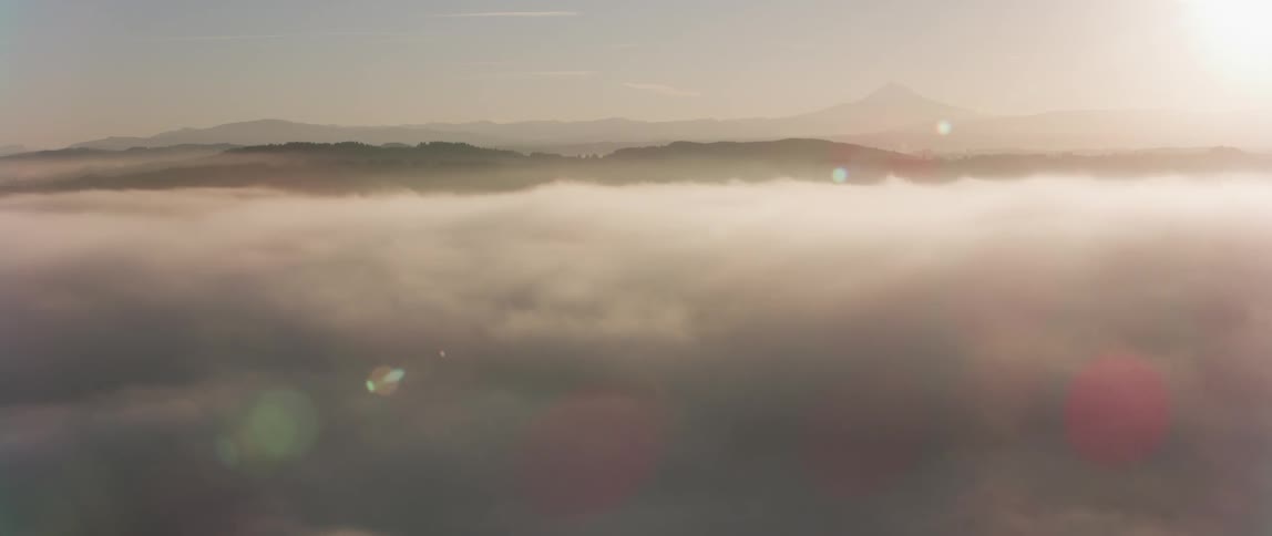 Fog and haze cover the landscape