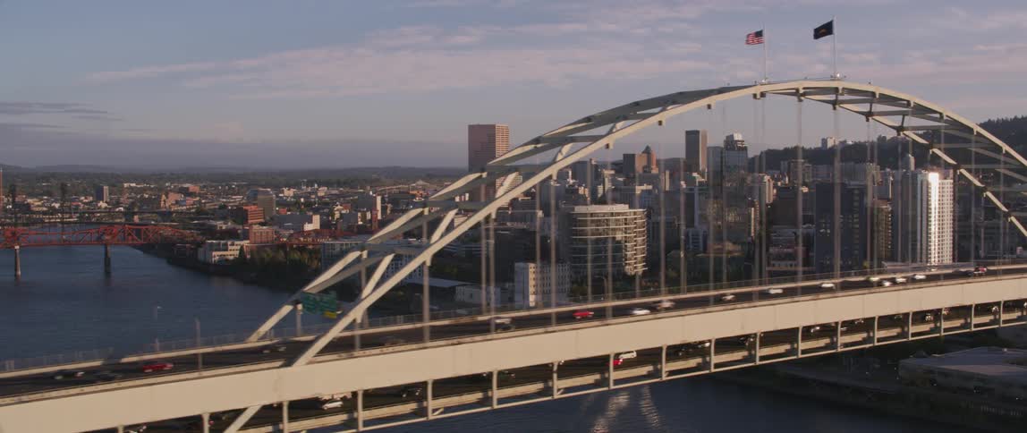 Traffic moves across a city bridge
