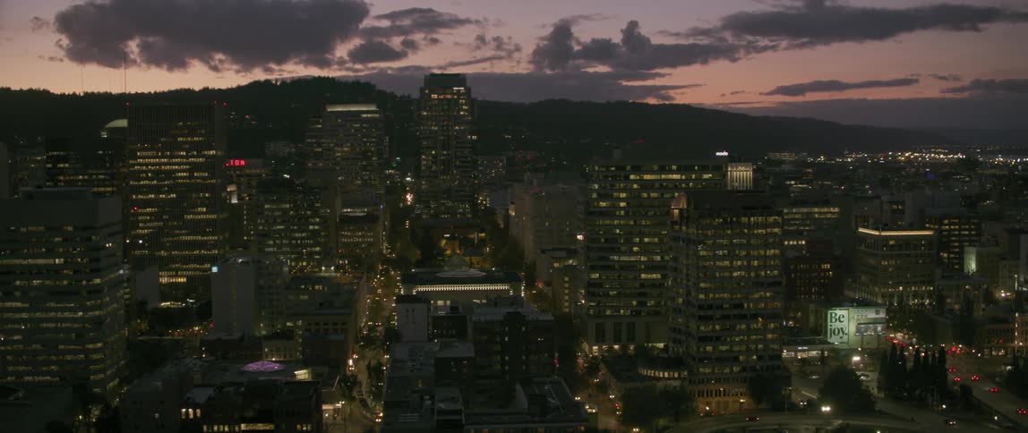 Large city at a cloudy sunset