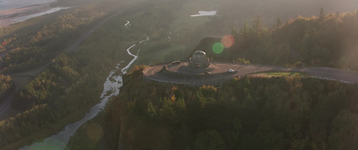 Domed structure built high on a hilltop as a river flows below it