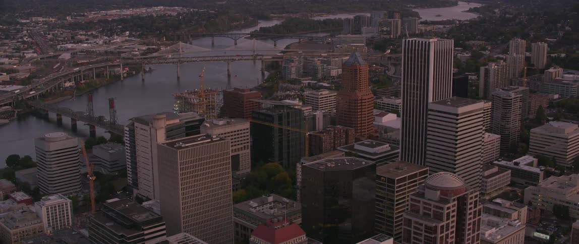 Tall city buildings tower into the sky