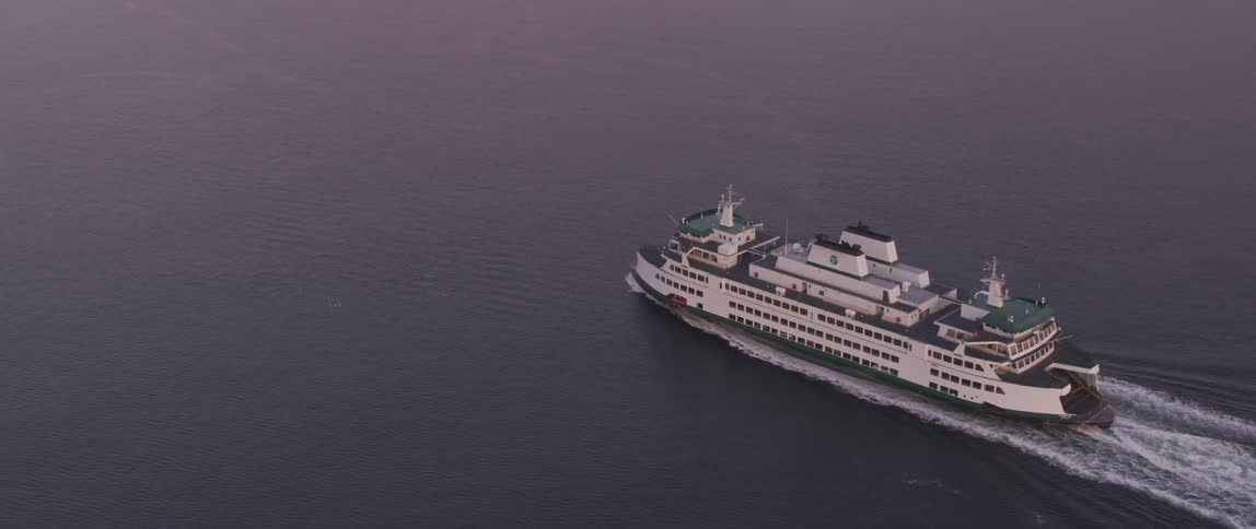 A cruise ship travels on the water