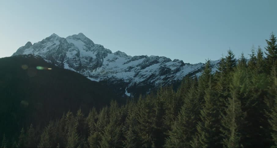 The mountain top ahead is covered with snow
