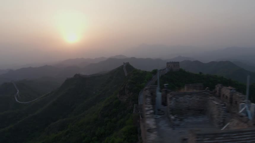 Sun rises over a mountain range