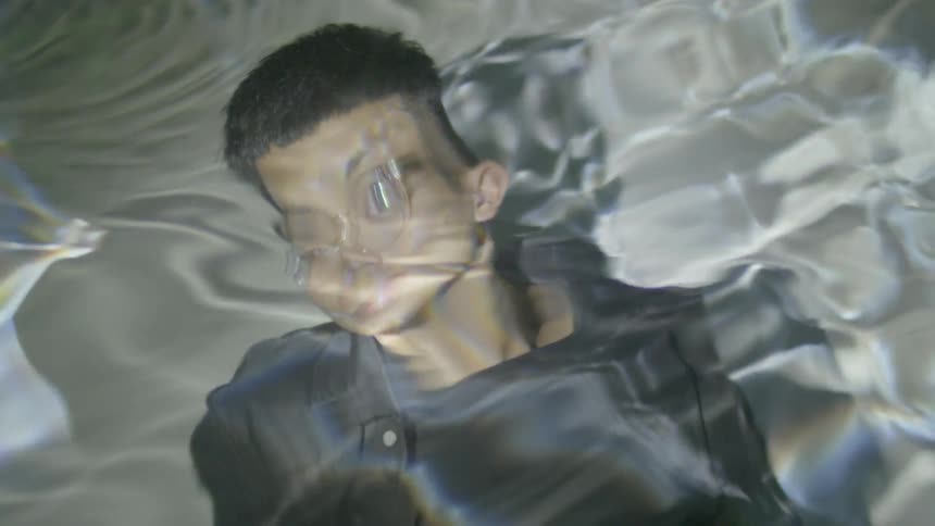 Water reflecting over a man