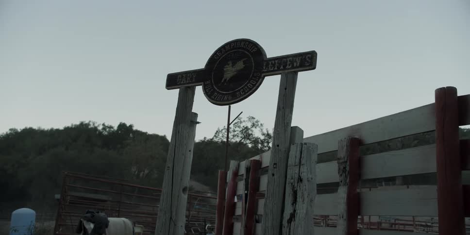 The sign is shaded at sunset