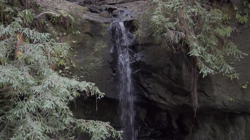 Water flows down the cliffs