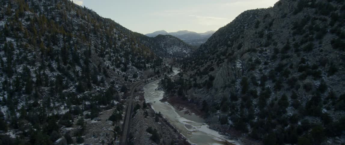 Stream flows between the mountains
