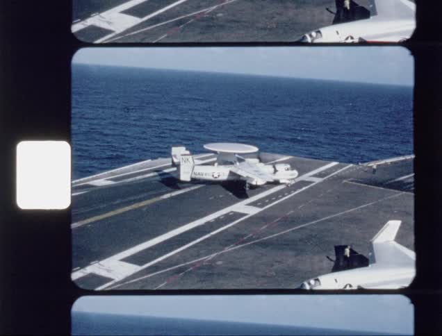 The jet is slowly turning around on the ocean hangar
